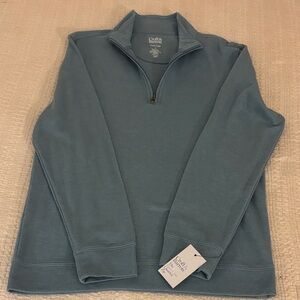 Men’s quarter zip sweater .